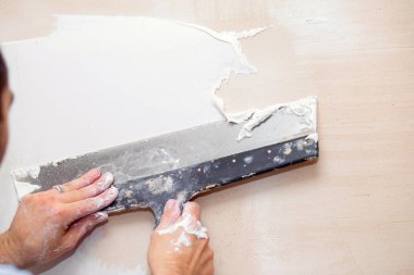 Duvarları doldurma süreci. Yaşam alanlarının tamiri. Macunla iç dekorasyon. Stucco beyaz astar