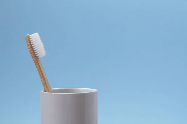 White Bamboo Toothbrush White Glass Blue Background Ecological Zero Waste — Stock Photo, Image