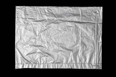 Siyah arkaplanda metal rengi plastik torba dokusu