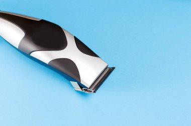 electric clipper on a blue background