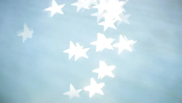 mavi arkaplanda yıldız şekilli bokeh