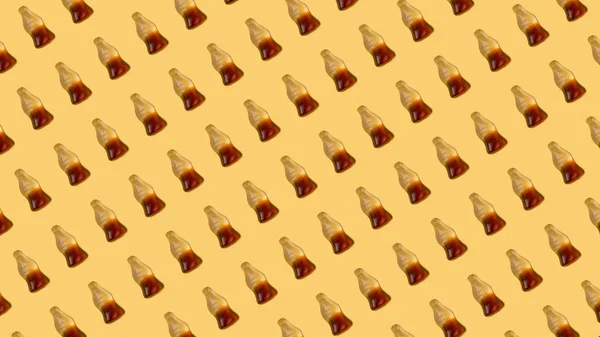 콜라 젤리 노란색 배경 패턴 — 스톡 사진