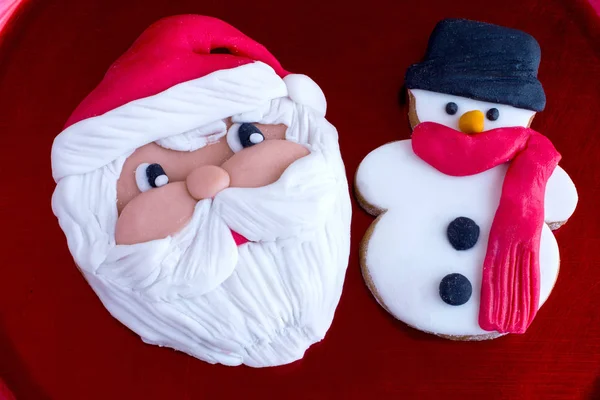 Santa Claus and snowman cookies — Stock Photo, Image