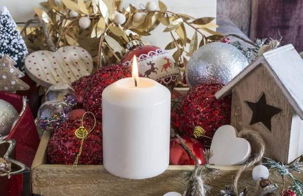 Flaming Christmas candle — Stock Photo, Image