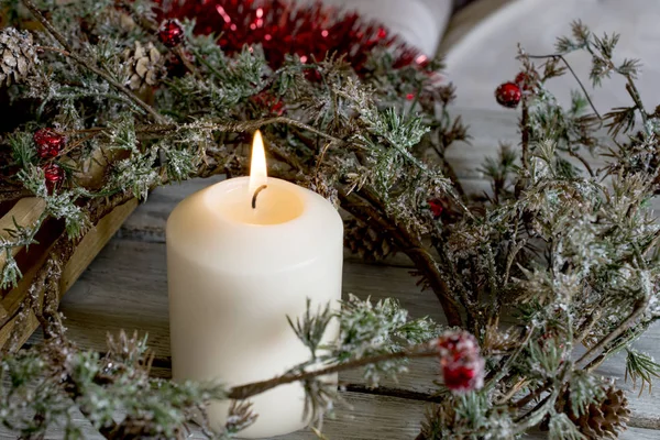 Candle and Christmas wreath — Stock Photo, Image