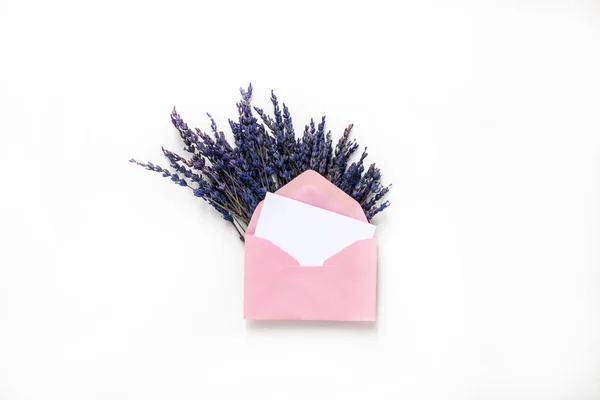 Pink envelops with flowers — Stock Photo, Image
