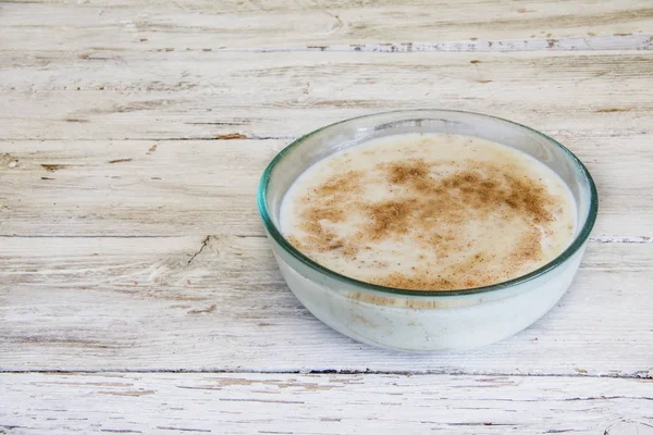 Rice with milk and cinnamon. — Stock Photo, Image