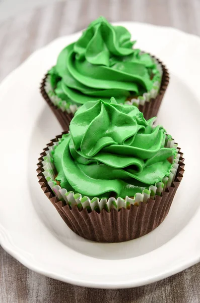 Cupcakes decorated with butter cream — Stock Photo, Image