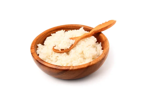 Gekochter weißer Reis in einem Holzteller mit Holzlöffel. — Stockfoto