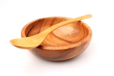 İzole kaşık ile ahşap plaka.