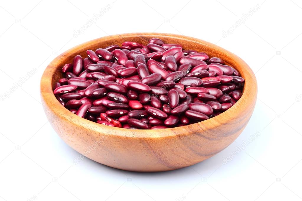 Red beans in the wooden plate.