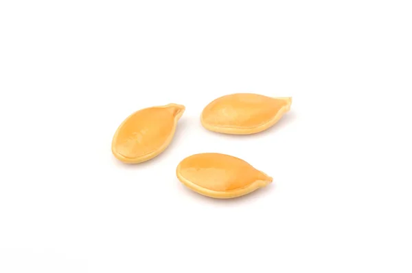 Three pumpkin seeds closeup. — Stock Photo, Image