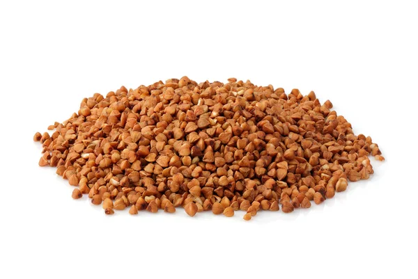 Buckwheat piles; buckwheat groats isolated. — Stock Photo, Image