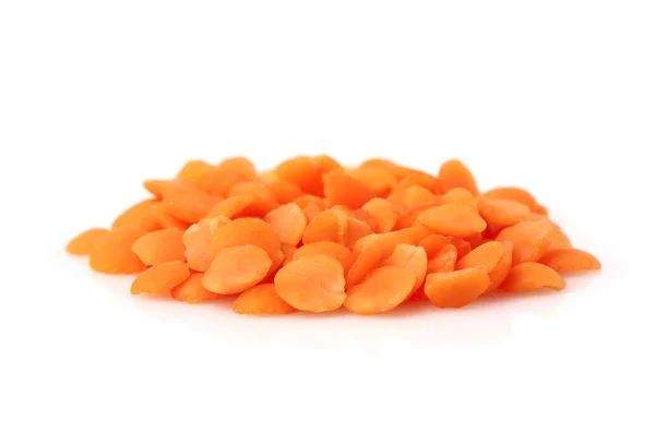 Heap of raw red lentils isolated. — Stock Photo, Image