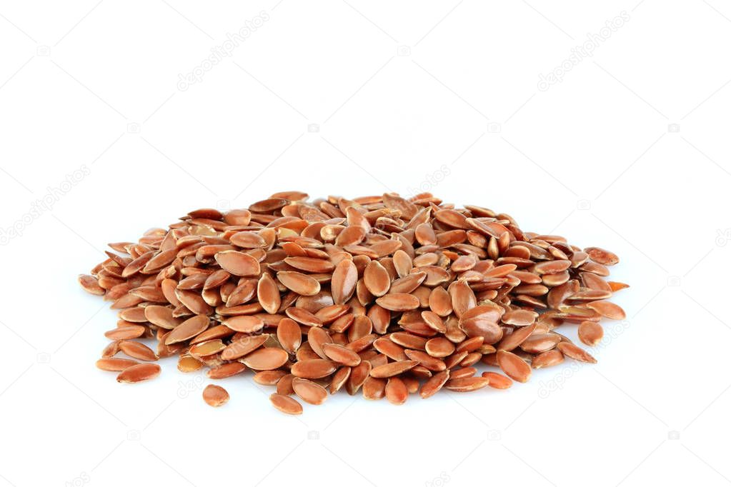 Brown flax seeds pile isolated.
