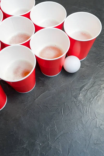 Beer pong. Popular game at parties. Place for your text.