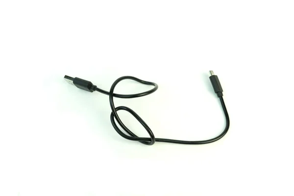 De USB-kabel is zwart. Foto op witte achtergrond. — Stockfoto