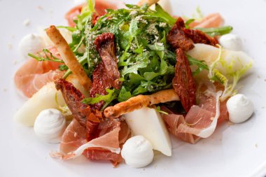 Parma ham ve kavun salatası.