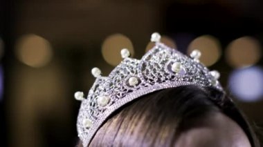 Crown beauty queen sparkles luxury close up symbol female dream fashion show 4K.