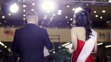 Beautiful leading fashion show speak stage close up speech people on catwalk 4K.