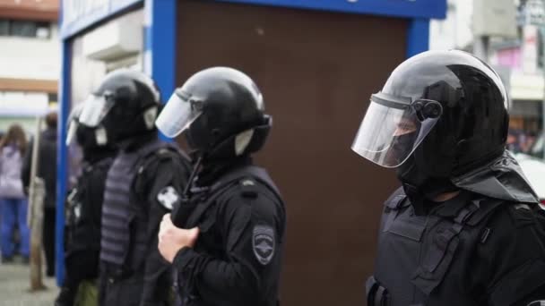 Helmet armed special forces stand on street close up protect order. Strike man. — Stok video