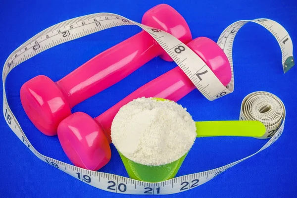 Dumbbells with tape measure and whey powder — Stock Photo, Image