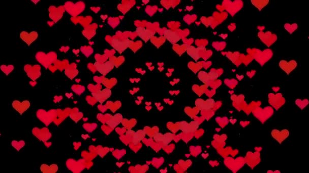 Flying corazones en varios colores en negro — Vídeo de stock