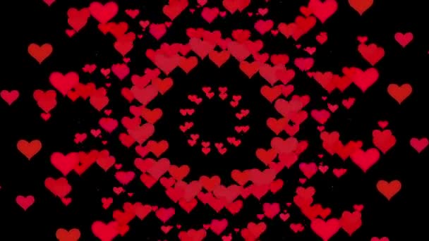 Coeurs volants en différentes couleurs sur noir  