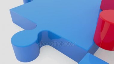 Beyaz üzerine kırmızı ve mavi renklerde hareketli puzzle parçaları