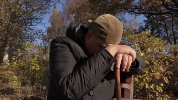 Depressed disabled man with cane — Stock Video