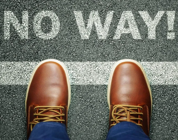 Man near inscription no way on asphalt — Stock Photo, Image