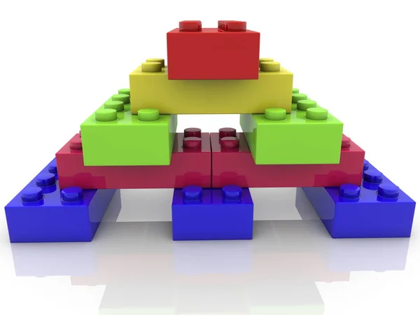 Piramide van speelgoed bakstenen close-up — Stockfoto