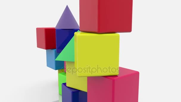 Cubes de jouets empilés avec des toits de différentes couleurs sur blanc 