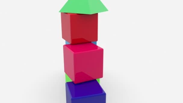 Drehpyramide aus Spielzeugwürfeln mit Dach auf der Spitze — Stockvideo