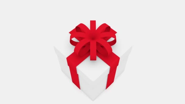 Caja de regalo con cinta roja de cerca — Vídeo de stock