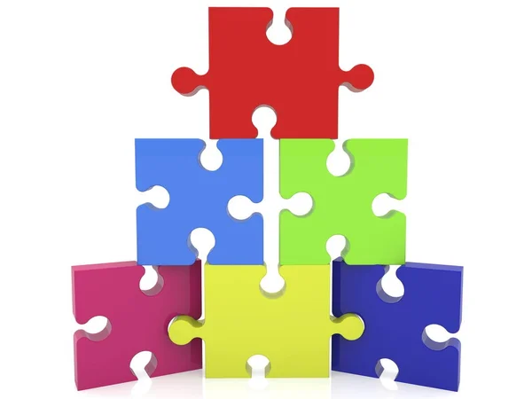 Pyramid of puzzle pieces in various colors — Stock Photo, Image