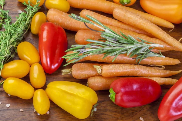 Carrots with basil, thyme, peppers — Stock Photo, Image