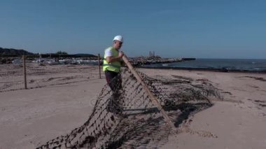Pier yakınındaki çit geri yükleme alt