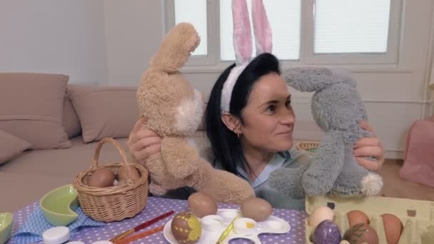 Woman Plays Toy Bunnies — Stock Video