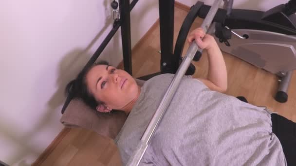 Woman Doing Barbell Bench Press — Stock Video