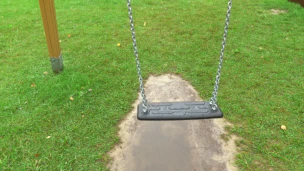 Swings Chains Rainy Day — Stock Video