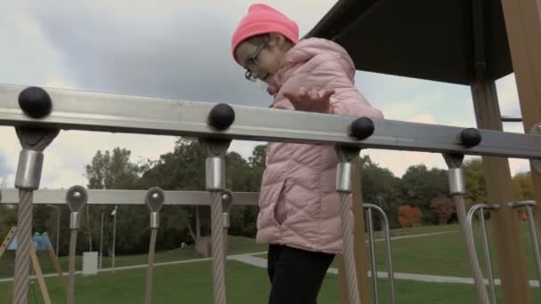 Cute Little Girl Public Playground Autumn Day — Stock Video