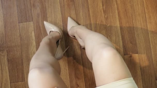 Top View Sitting Woman Legs High Heels — Stockvideo