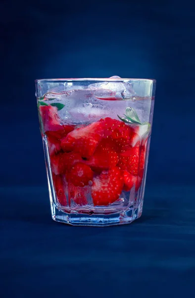 strawberry cocktail with strawberry on a black background