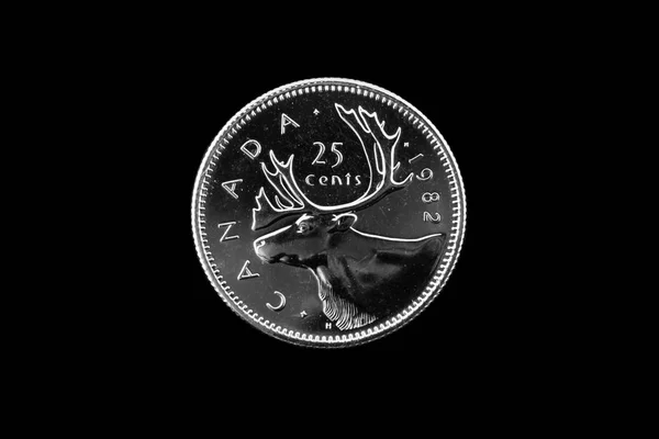 Old Canadian quarter on a black background — Stock Photo, Image