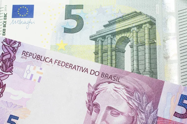 Five Euro Bank Note Pink Purple Five Brazilian Reais Bill — Stock Photo, Image