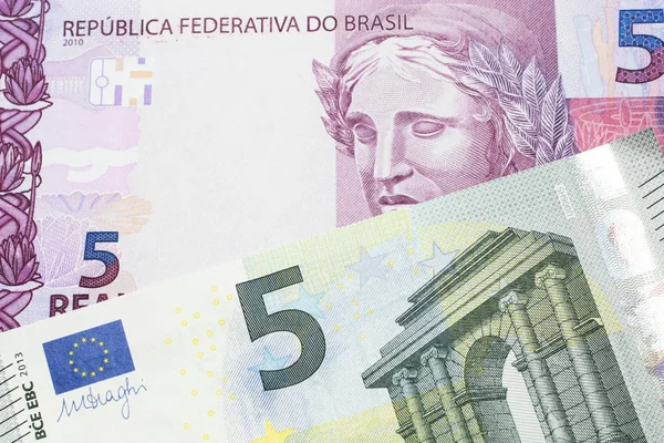 Five Euro Bank Note Pink Purple Five Brazilian Reais Bill — 스톡 사진