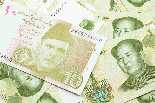 Una Imagen Cerca Billete Banco Una Rupia Naranja Diez Paquistaníes — Foto de Stock