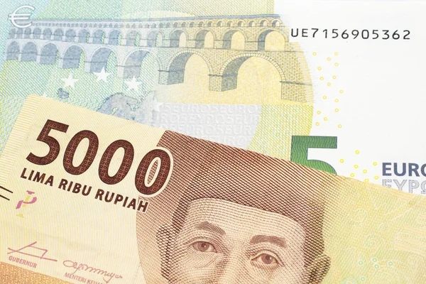 Eine Orangefarbene Fünftausend Indonesische Rupiah Banknote Mit Einem Fünf Euro — Stockfoto