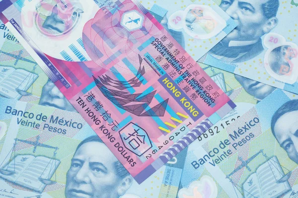 Зображення Барвистого Гонконгського Долара Макросовому Ліжку Мексиканських Банкнот Номіналом Песо — стокове фото